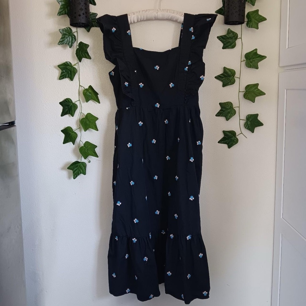 Vestique Black Midi Dress with Blue Floral Accents